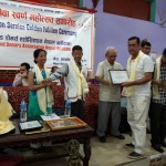 a-sssion-voilunteer-receiving-certificate-of-appraisal-on-golden-jubilee-ceremony-of-blodan