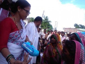 6c.Distributing sanitary napkins to flood victim women at Kapilvastu  